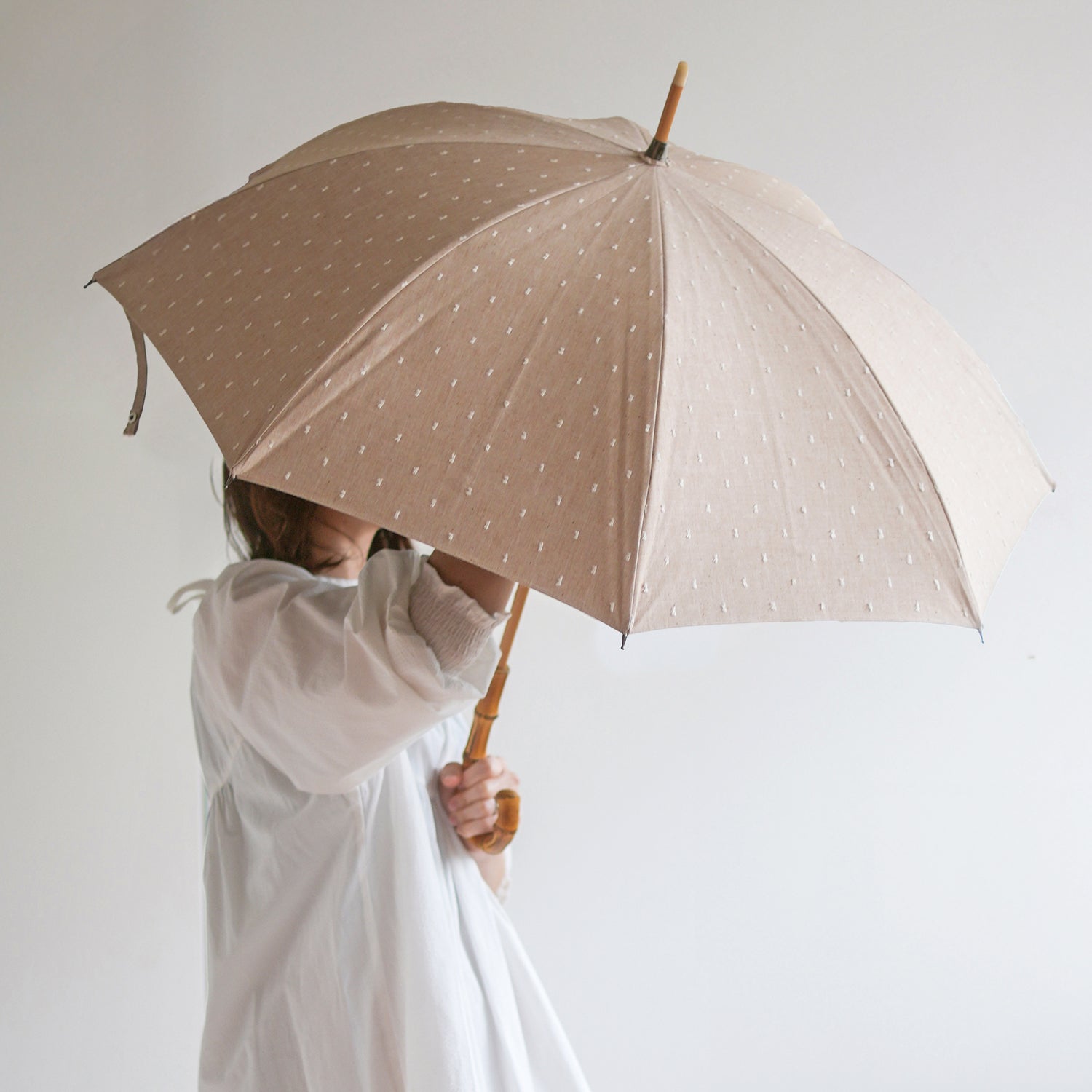 長傘 レディース 日傘・晴雨兼用傘　立体的なドット柄がかわいい、機能的な晴雨兼用傘
